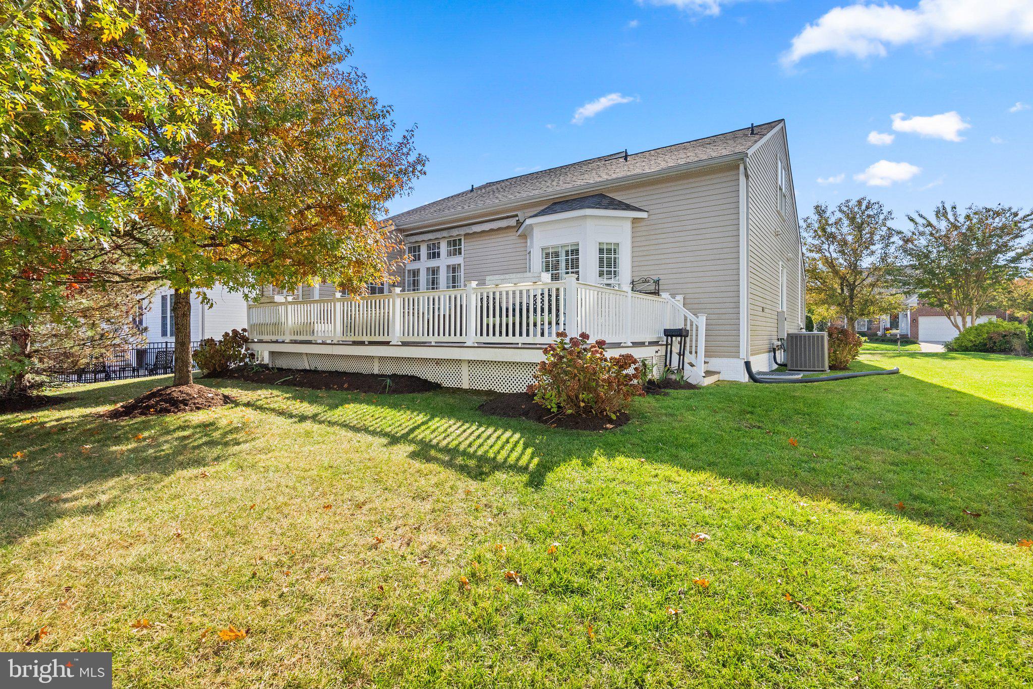1256 Destiny Circle Annapolis, MD 21409 - Photo 41 of 49 a view of a house with a yard patio and fire pit