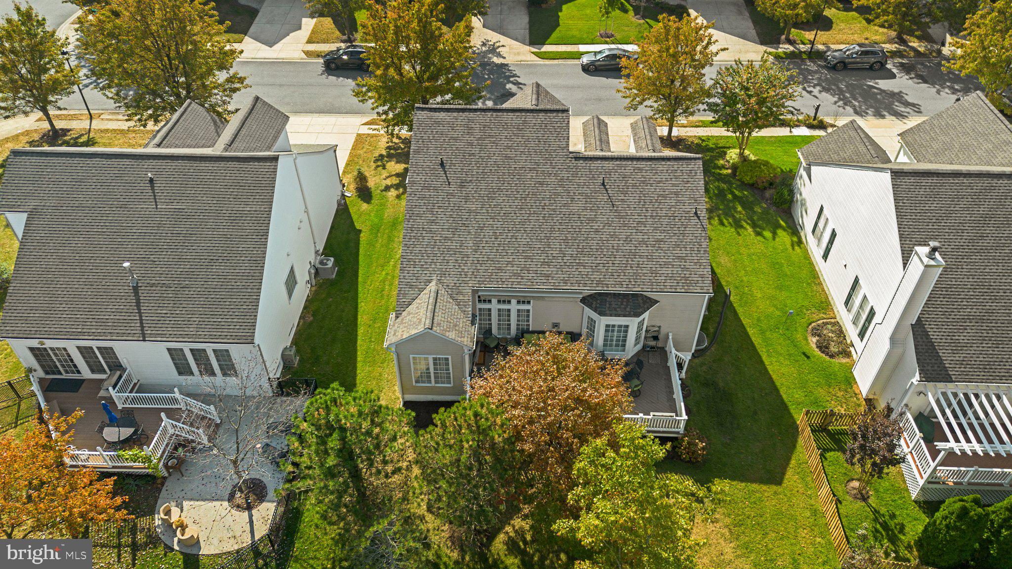 1256 Destiny Circle Annapolis, MD 21409 - Photo 43 of 49 an aerial view of a house with swimming pool and large trees