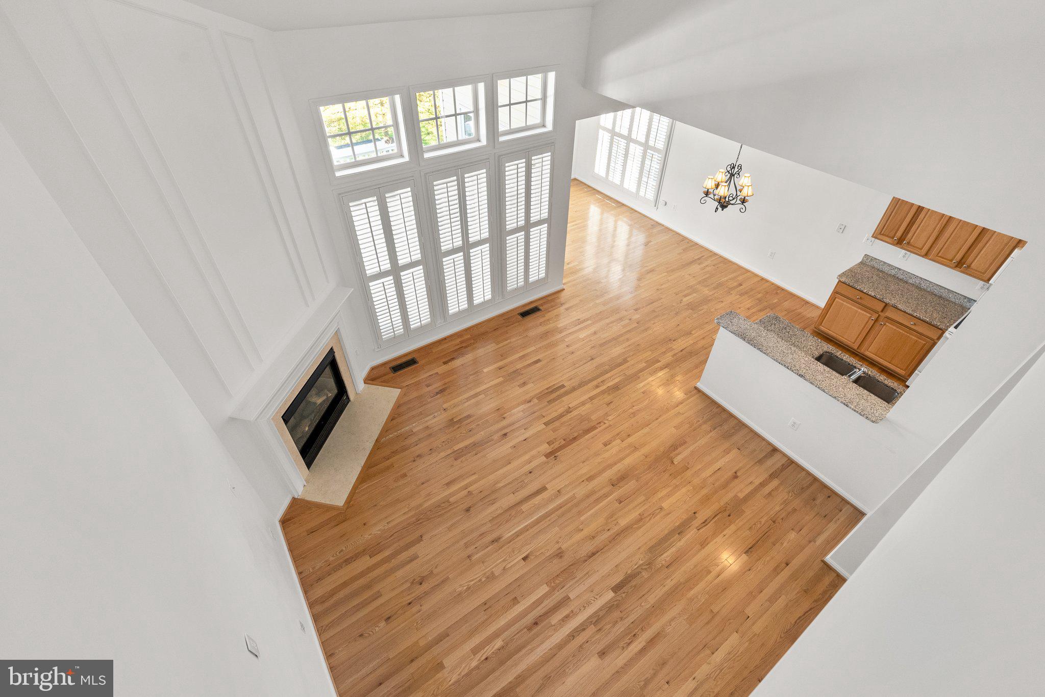 1256 Destiny Circle Annapolis, MD 21409 - Photo 5 of 49 a view of a living room with furniture and wooden floor
