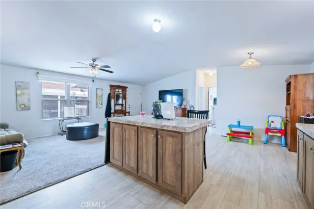 a room with furniture and a flat screen tv