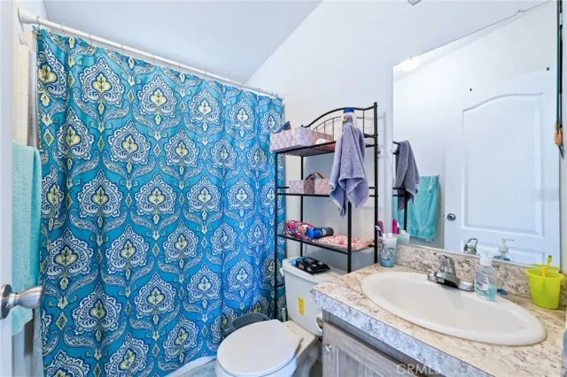 a bedroom with furniture and a bed