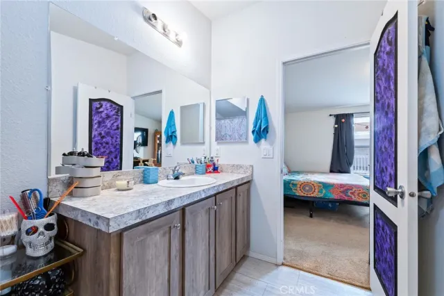 a view of a balcony with table and chairs