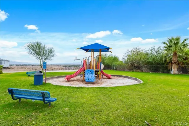 a view of swimming pool with outdoor seating