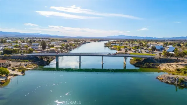 a view of a lake with city