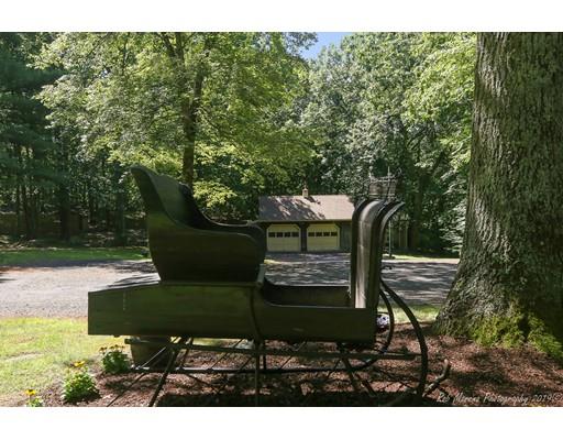 29 Spring Hill Road Newbury, MA 01922 - Photo 30 of 32 a view of a chairs and table in the backyard