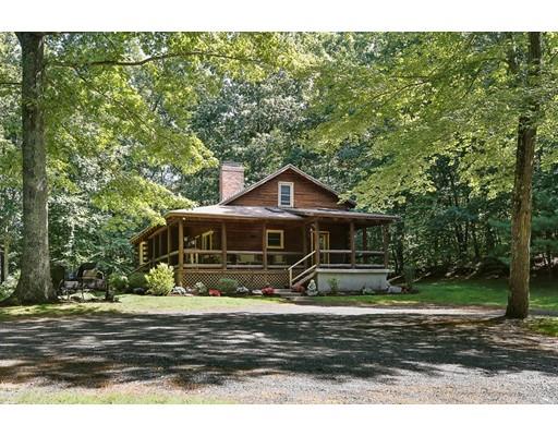 29 Spring Hill Road Newbury, MA 01922 - Photo 3 of 32 a front view of a house with a yard