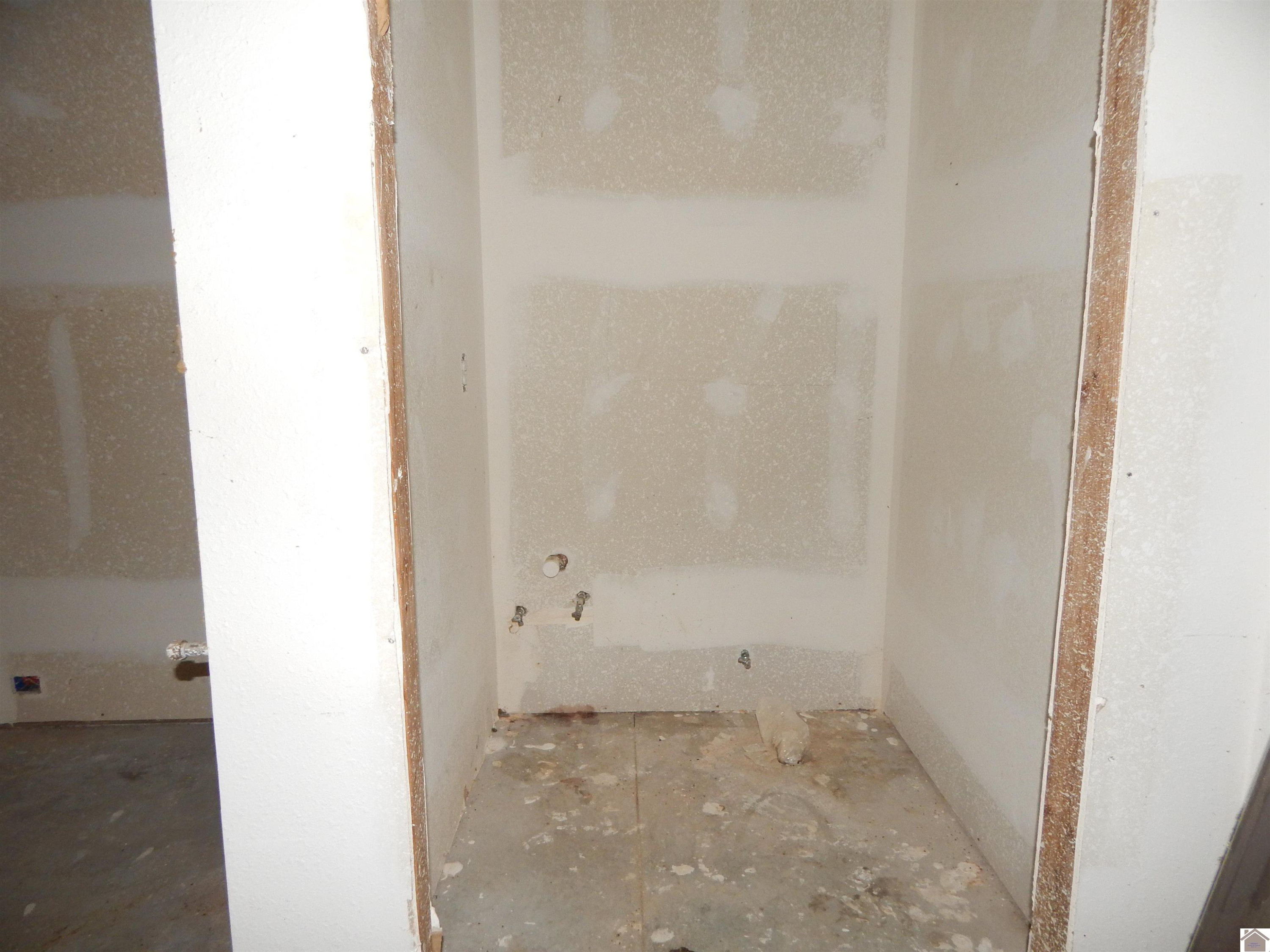 312 Belews Road Benton, KY 42025 - Photo 31 of 33 IN GARAGE ROUGHED IN 1/2 BATH