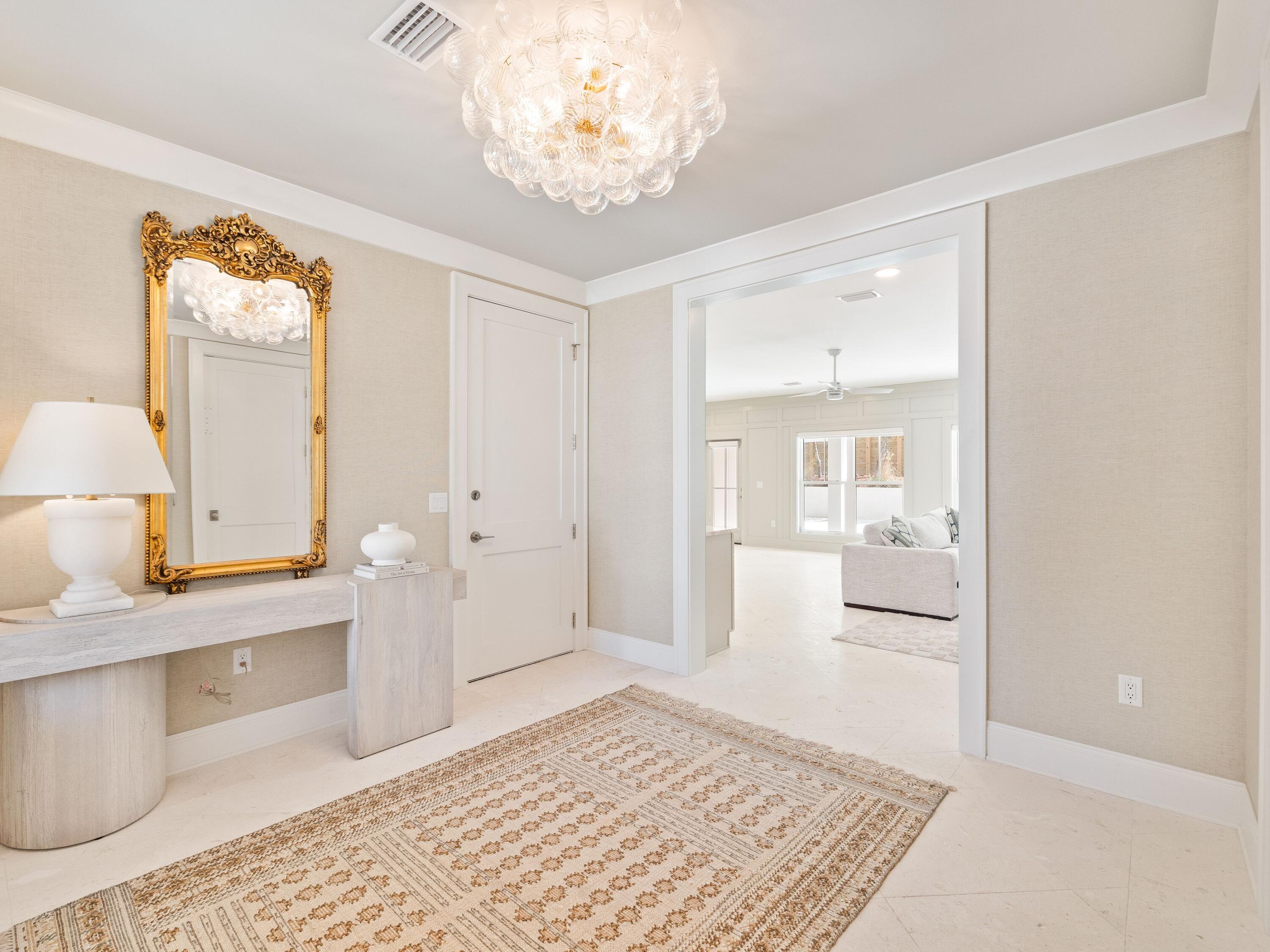 41 Marthas Lane Santa Rosa Beach, FL 32459 - Photo 28 of 101 a large white room with a mirror and a rug