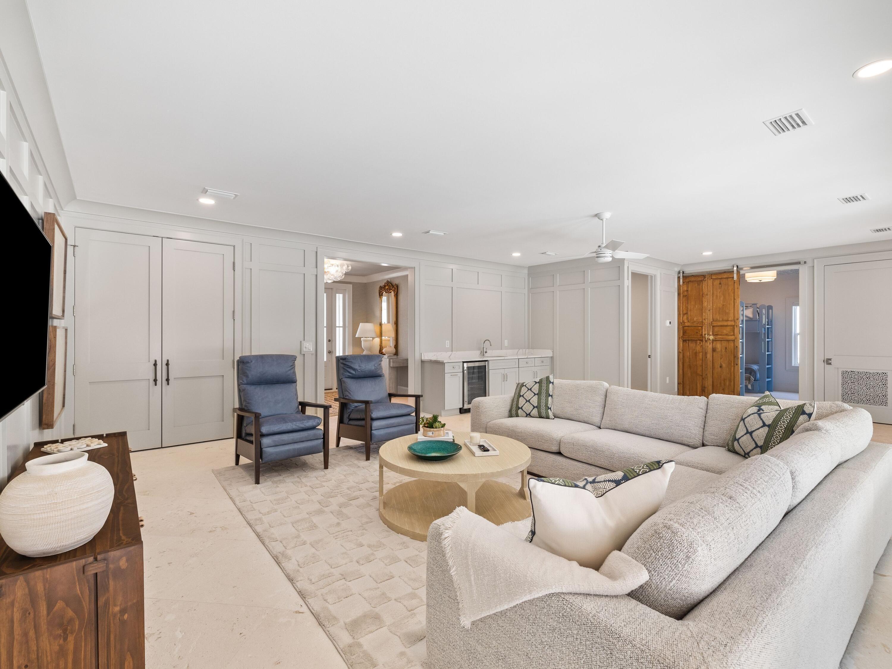 41 Marthas Lane Santa Rosa Beach, FL 32459 - Photo 33 of 101 a living room with furniture a couch and a flat screen tv
