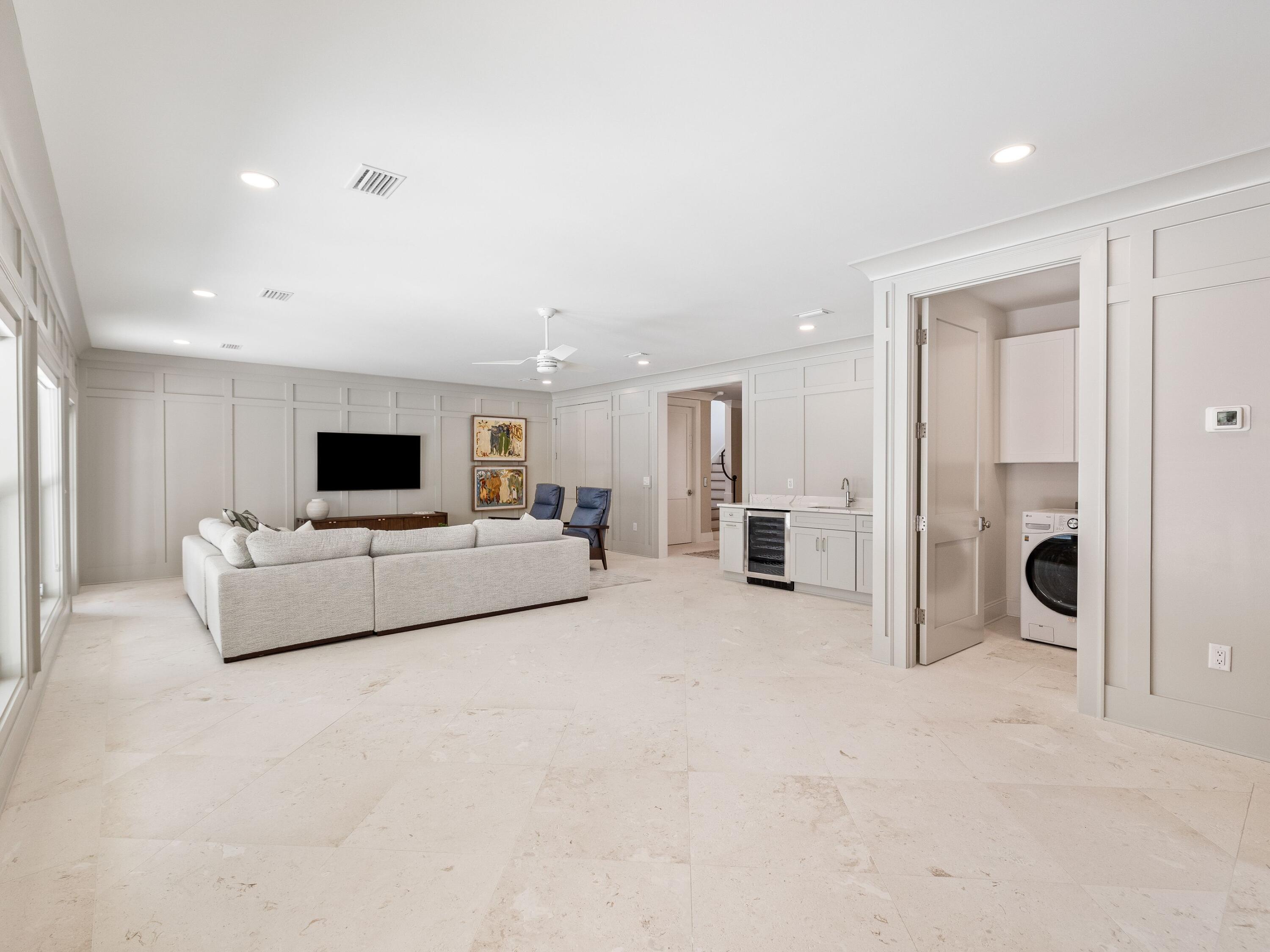41 Marthas Lane Santa Rosa Beach, FL 32459 - Photo 38 of 101 a living room with furniture and a flat screen tv