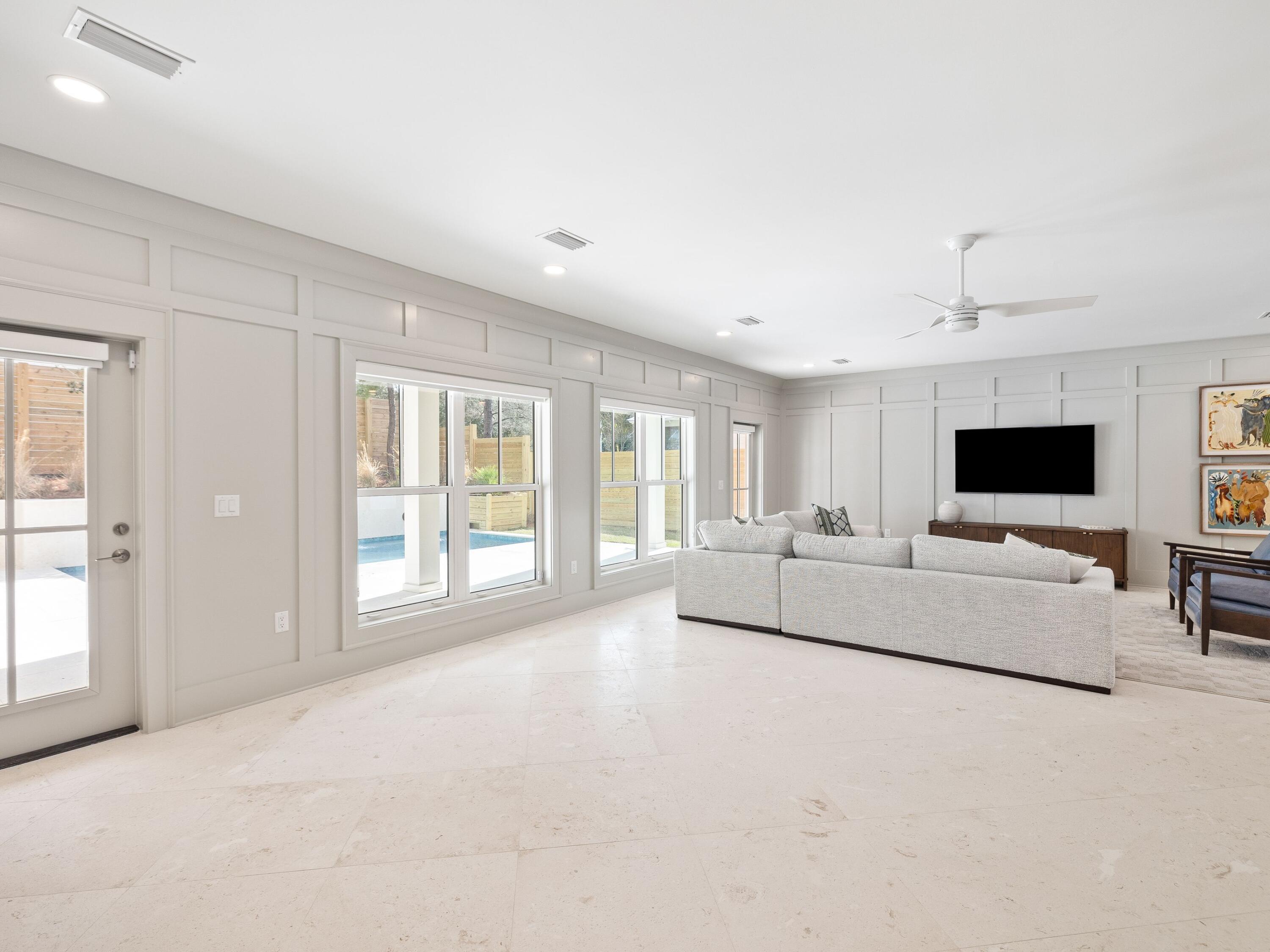 41 Marthas Lane Santa Rosa Beach, FL 32459 - Photo 39 of 101 a living room with furniture and a flat screen tv