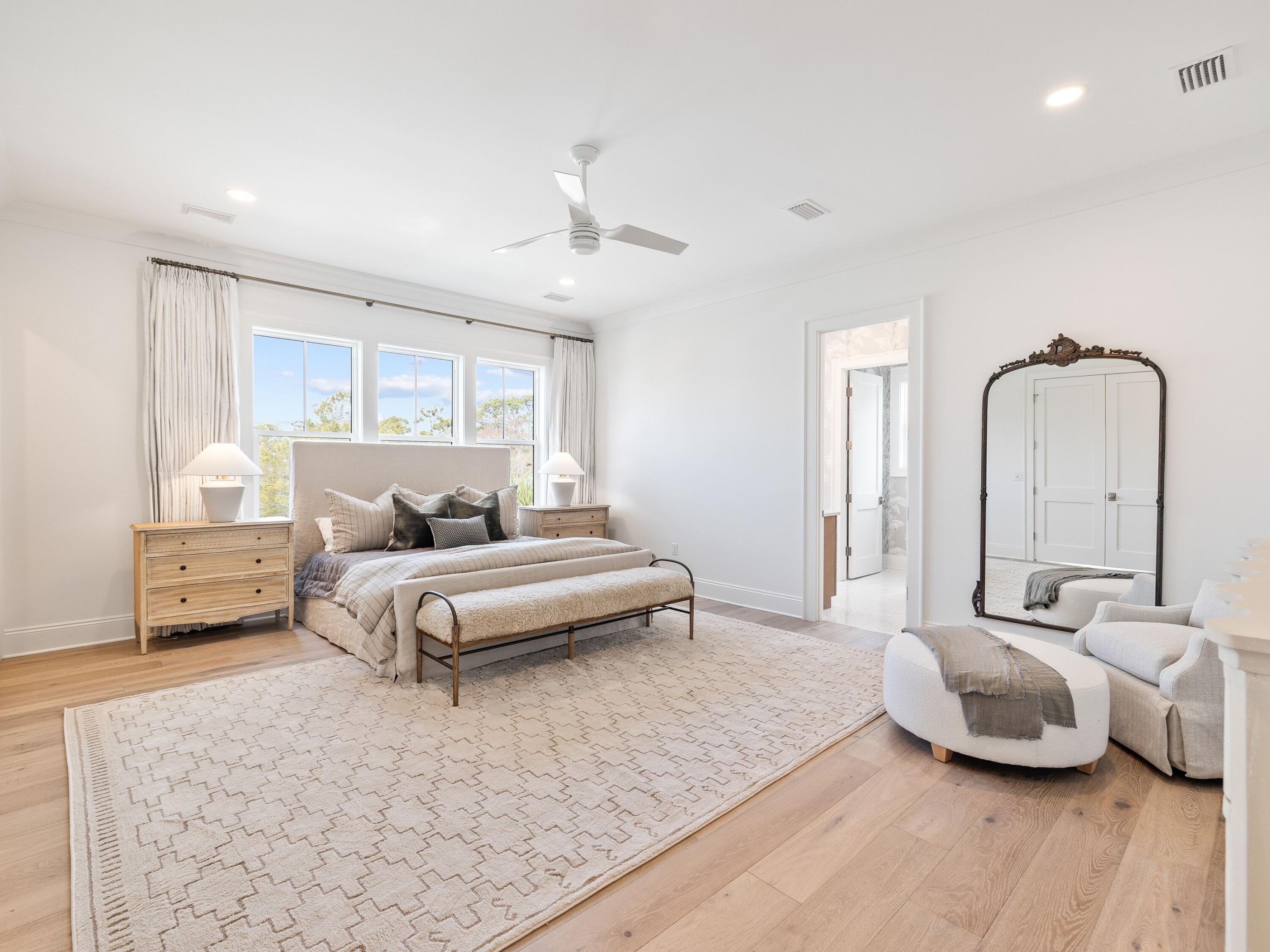 41 Marthas Lane Santa Rosa Beach, FL 32459 - Photo 66 of 101 a spacious bedroom with a bed and wooden floor