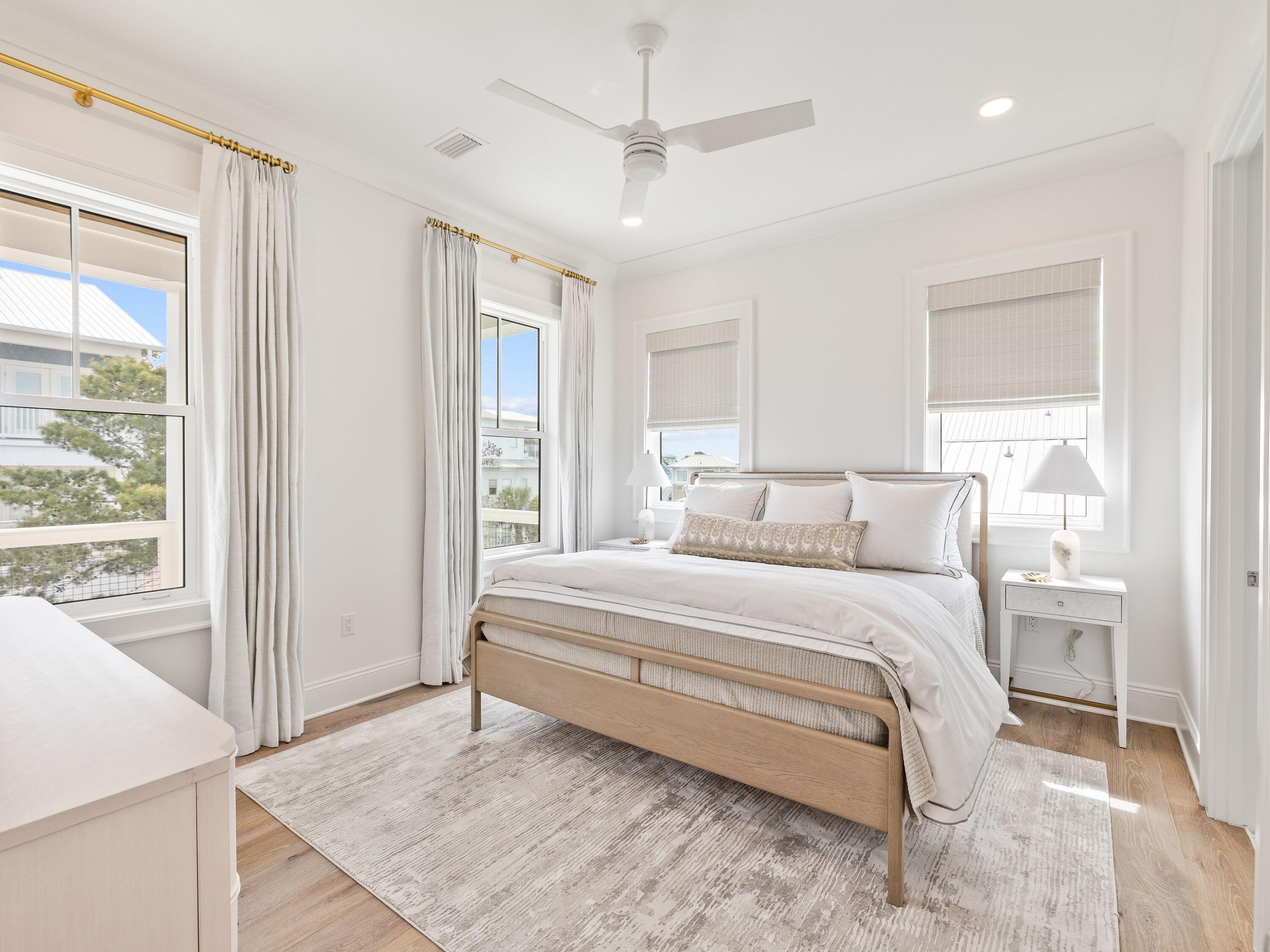 41 Marthas Lane Santa Rosa Beach, FL 32459 - Photo 80 of 101 a spacious bedroom with a bed and a cabinets