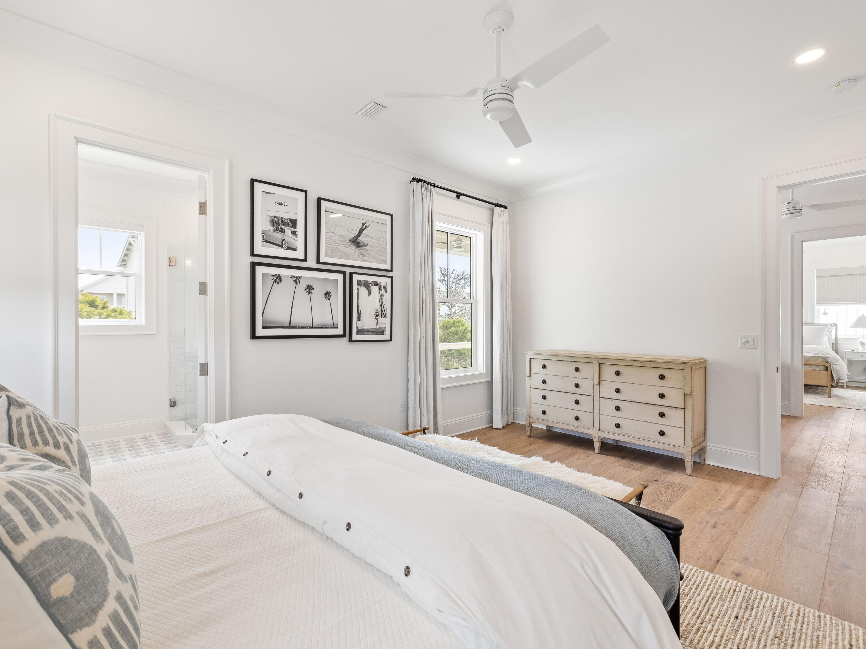 41 Marthas Lane Santa Rosa Beach, FL 32459 - Photo 85 of 101 a bedroom with a bed and a painting on the wall