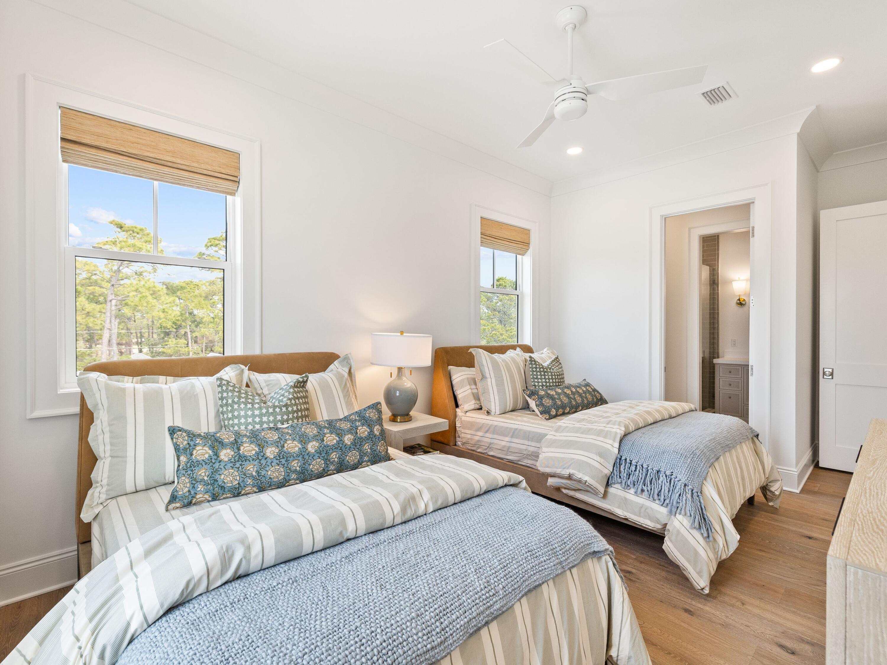 41 Marthas Lane Santa Rosa Beach, FL 32459 - Photo 96 of 101 a bedroom with two beds and a large window