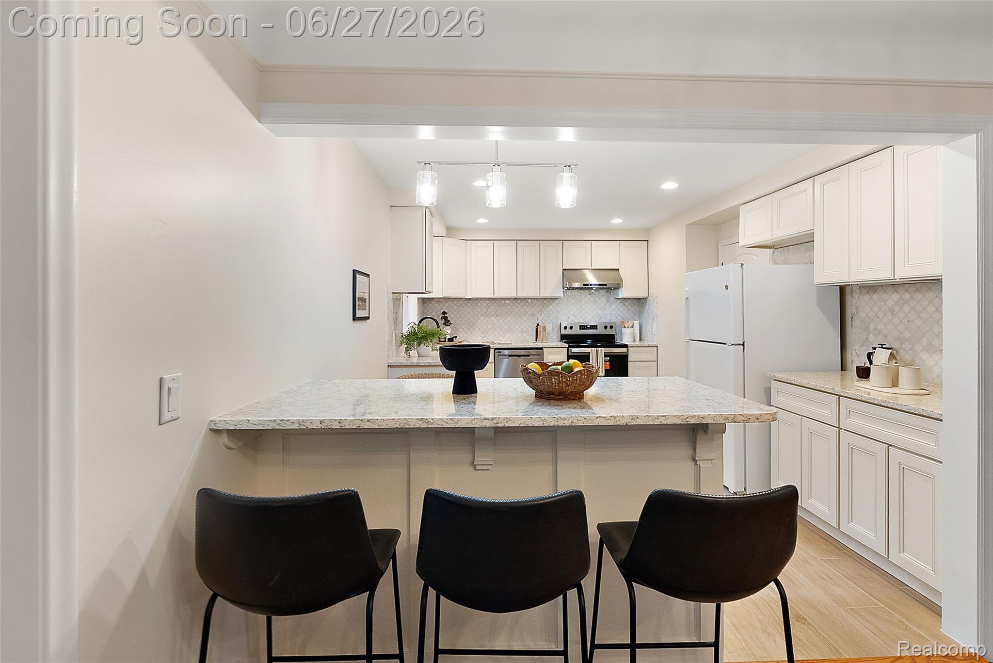 21235 River Road Grosse Pointe, MI 48236 - Photo 10 of 39 The newly renovated kitchen offers stylish finishes and modern functionality