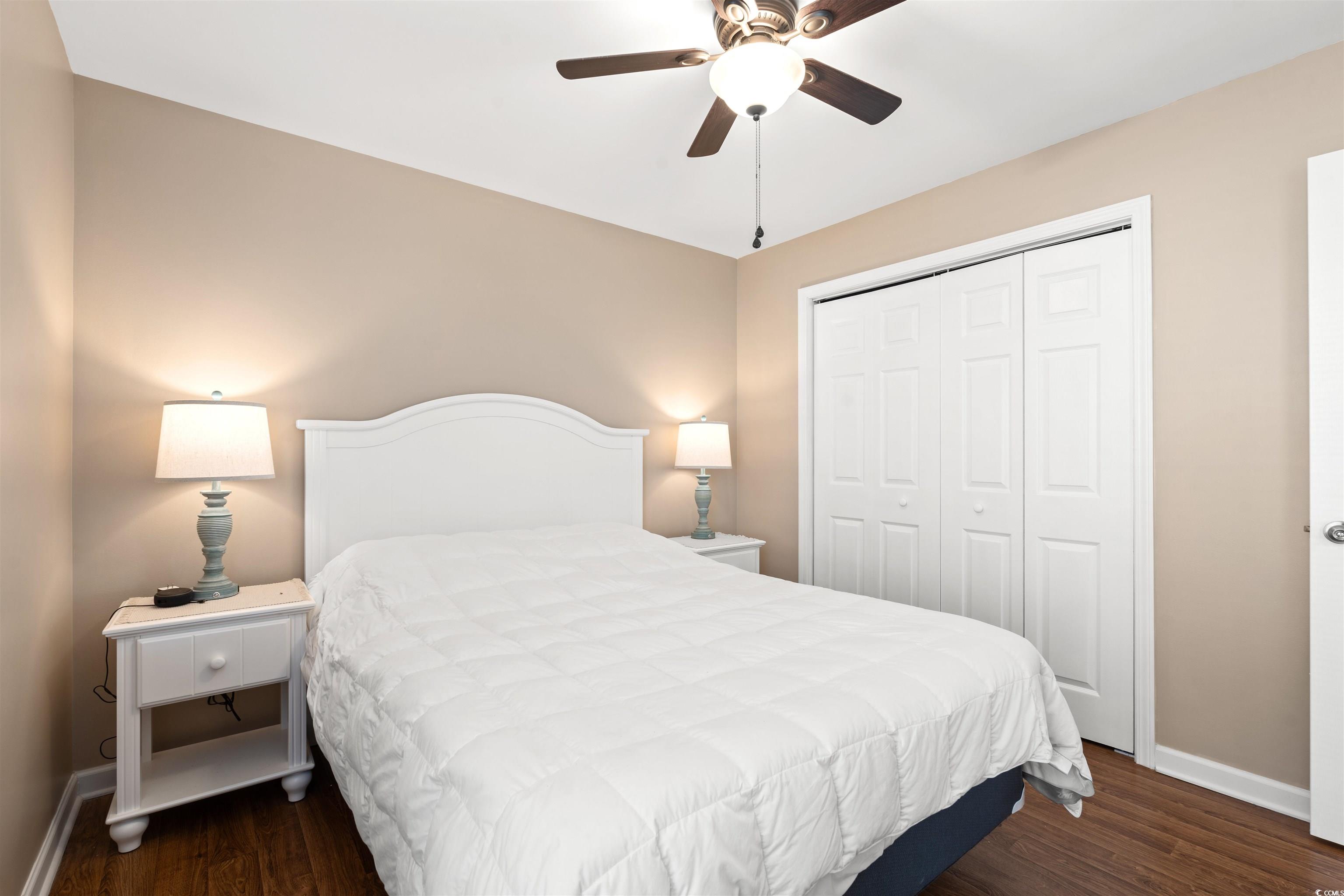1349 Boker Road Conway, SC 29527 - Photo 11 of 21 Bedroom featuring dark wood finished floors, a closet, and a ceiling fan