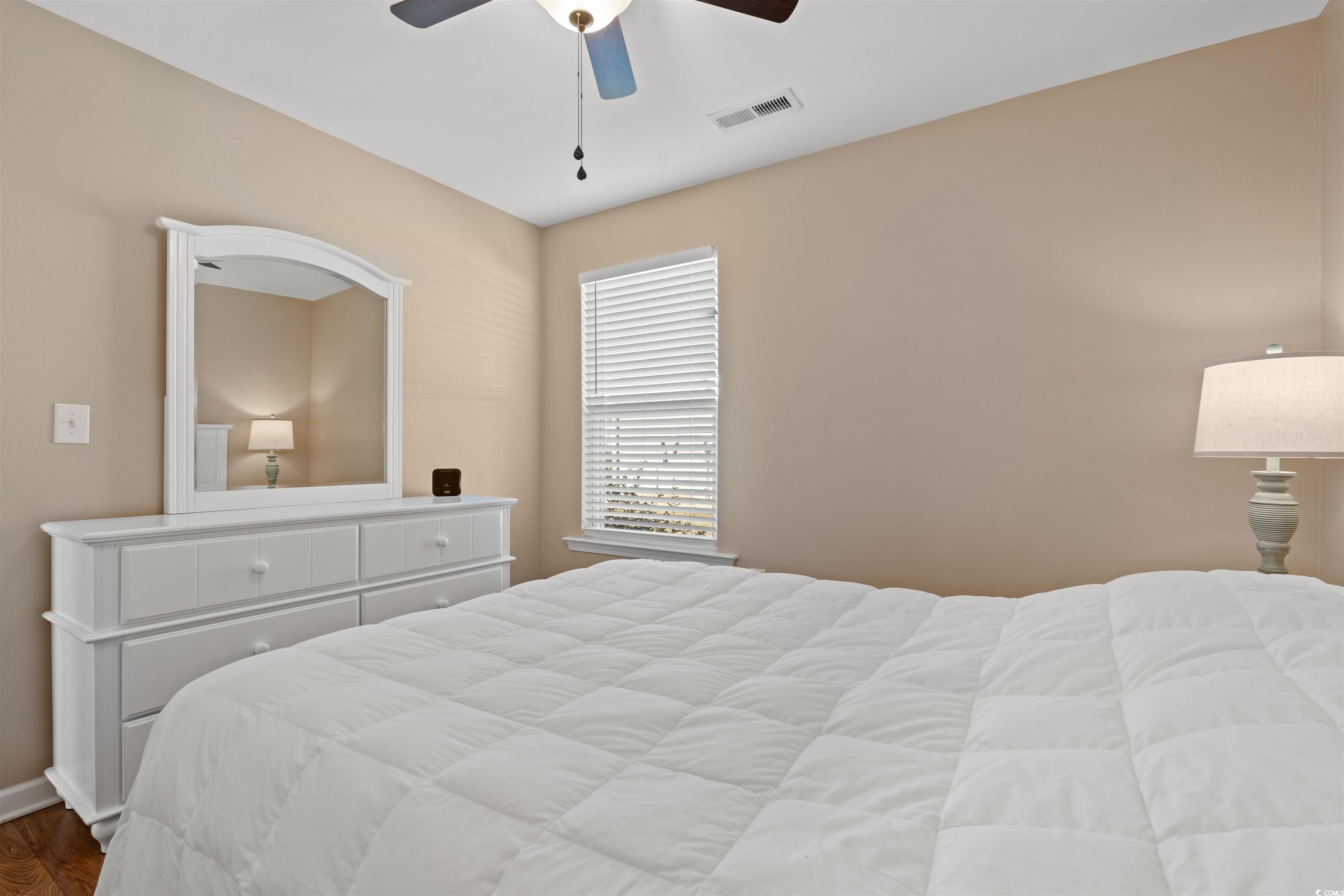 1349 Boker Road Conway, SC 29527 - Photo 12 of 21 Bedroom featuring dark wood finished floors and a ceiling fan