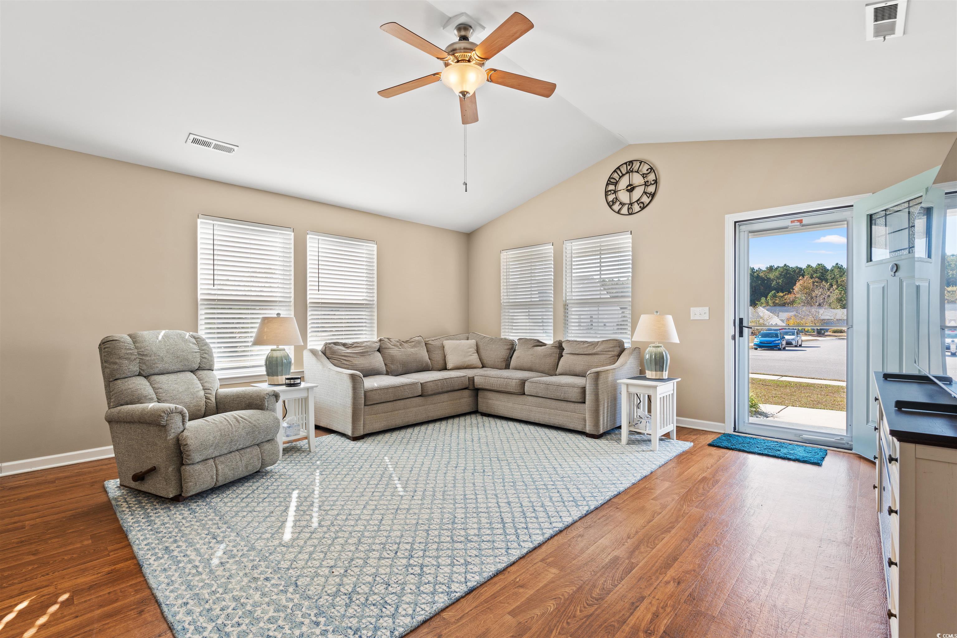 1349 Boker Road Conway, SC 29527 - Photo 2 of 21 Living room featuring vaulted ceiling, healthy amount of natural light, ceiling fan, and dark wood-style floors