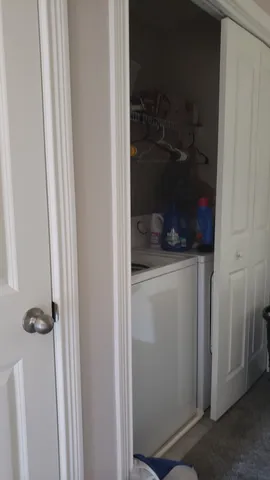 a view of yard with green space and seating