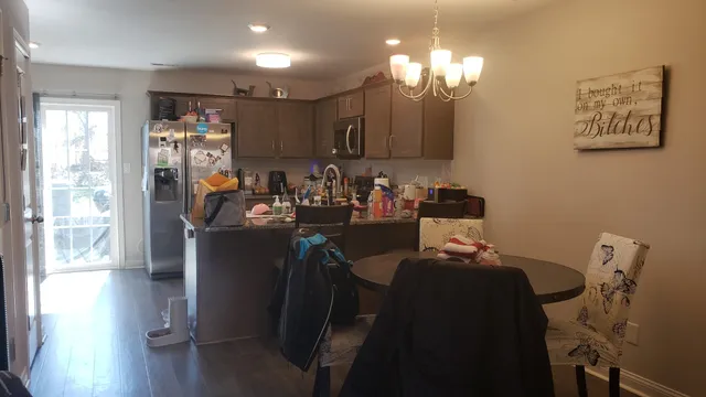 a room with furniture and chandelier