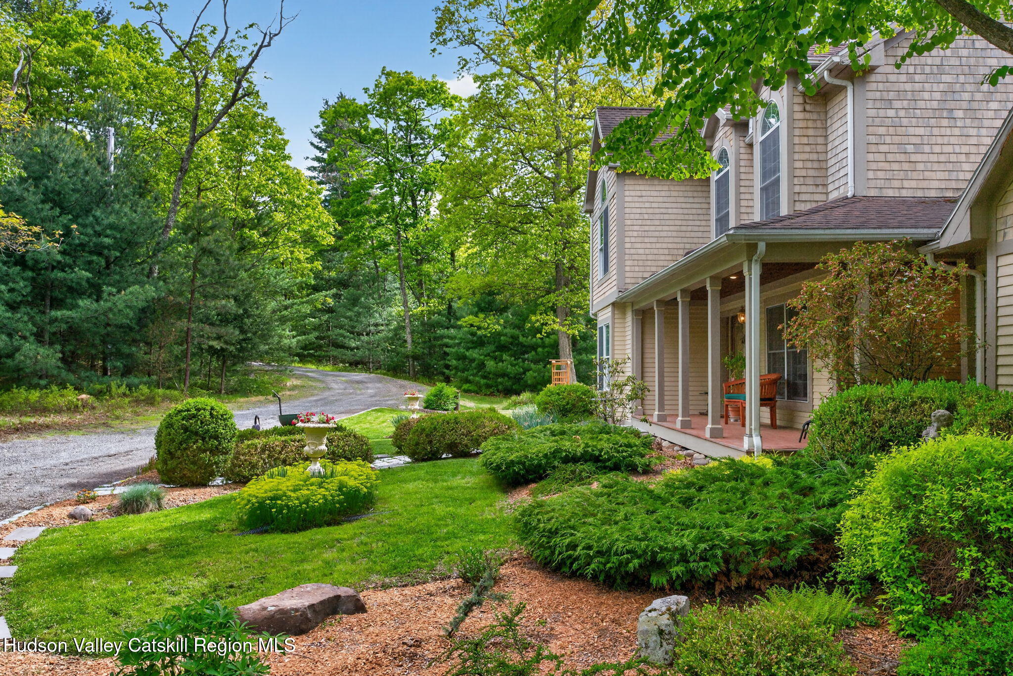 189 Bush Road Stone Ridge, NY 12484 - Photo 5 of 60 a view of a house with a yard and potted plants