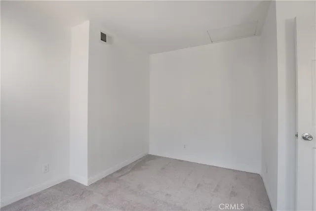 a view of a room with rack on the wall