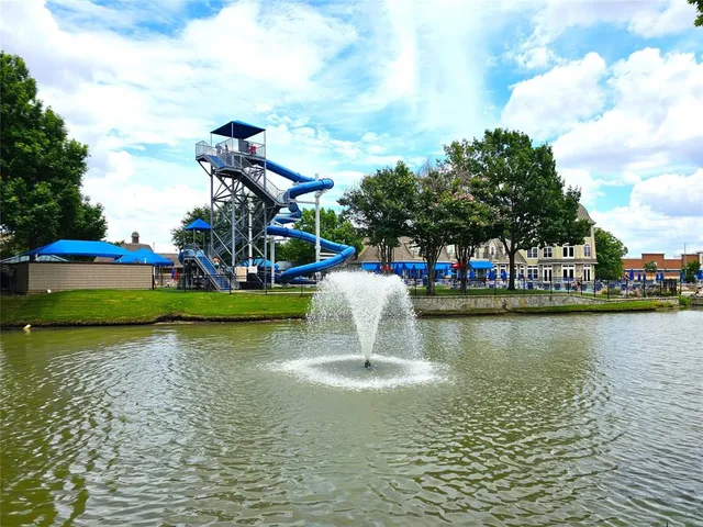 a view of a lake with houses
