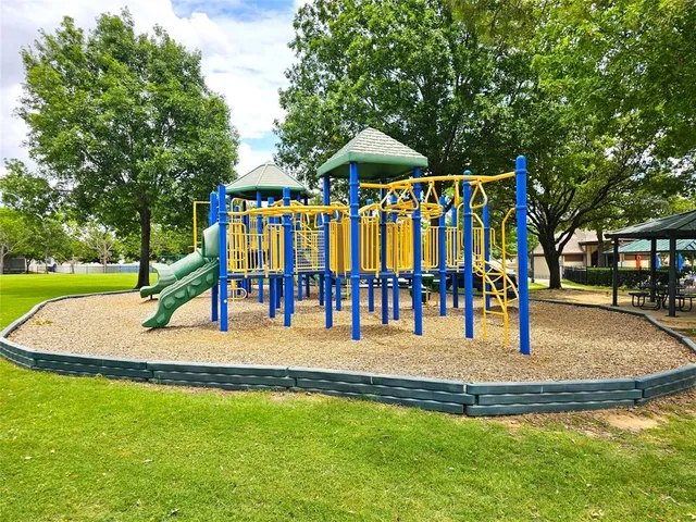 a view of outdoor space with garden and patio