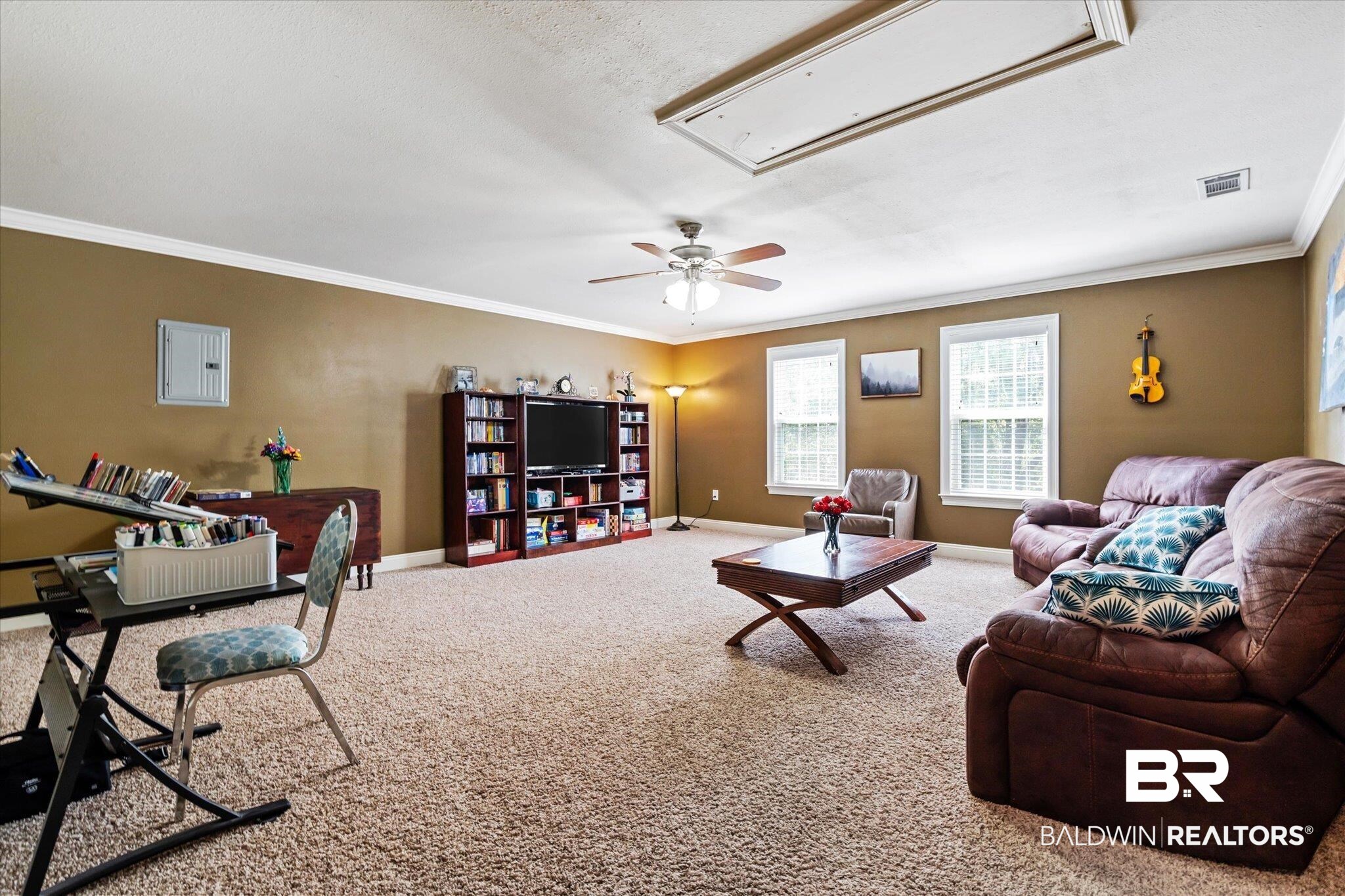 72 Limestone Drive Jackson, AL 36545 - Photo 22 of 38 Carpeted living room with ceiling fan and ornamental molding