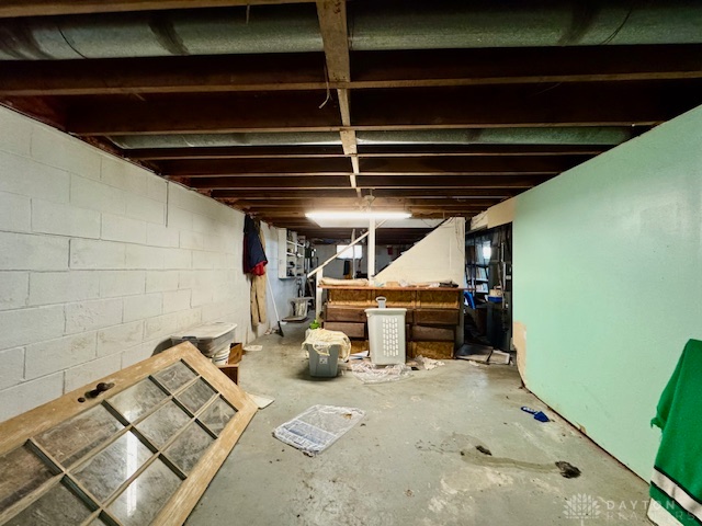 4733 Curtis Drive Springfield, OH 45503 - Photo 45 of 50 This spacious unfinished basement offers endless possibilities for customization and future expansion.