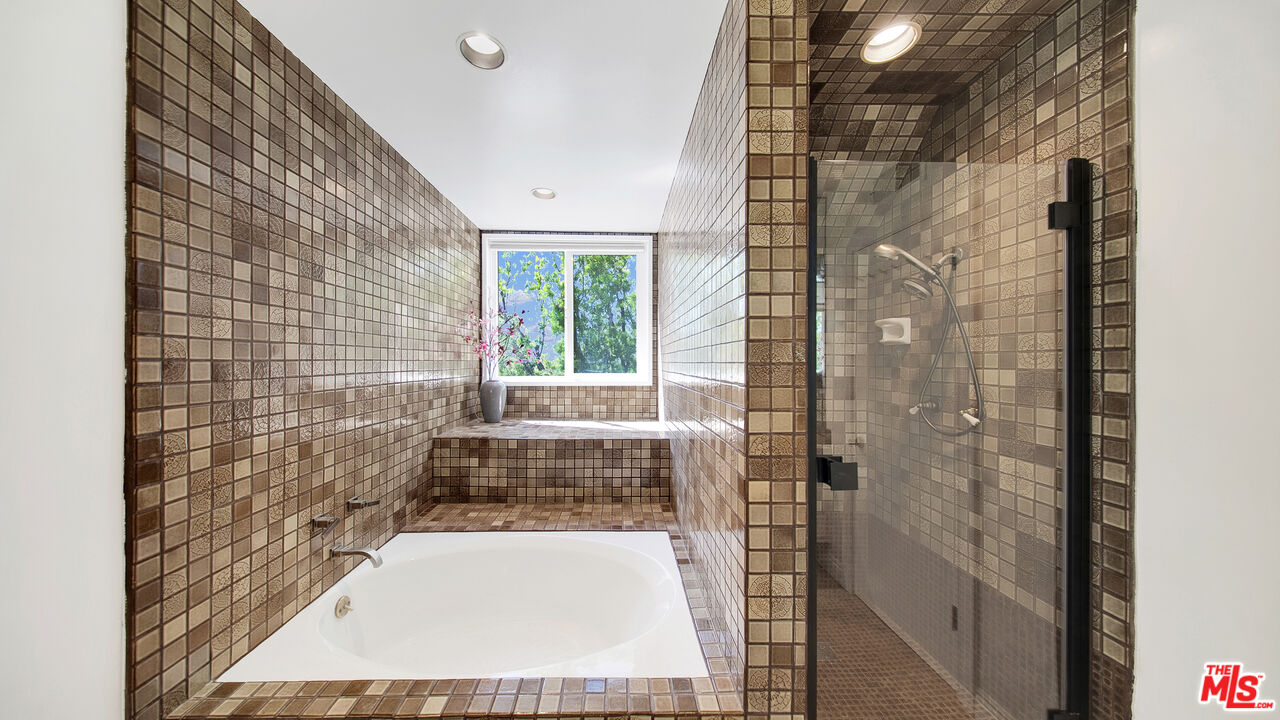 2312 Kimridge Road Beverly Hills, CA 90210 - Photo 36 of 60 a bathroom with a shower