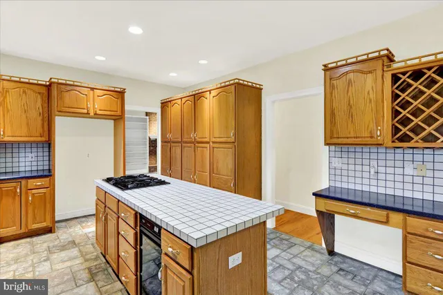 a view of a bathroom with a sink and a window