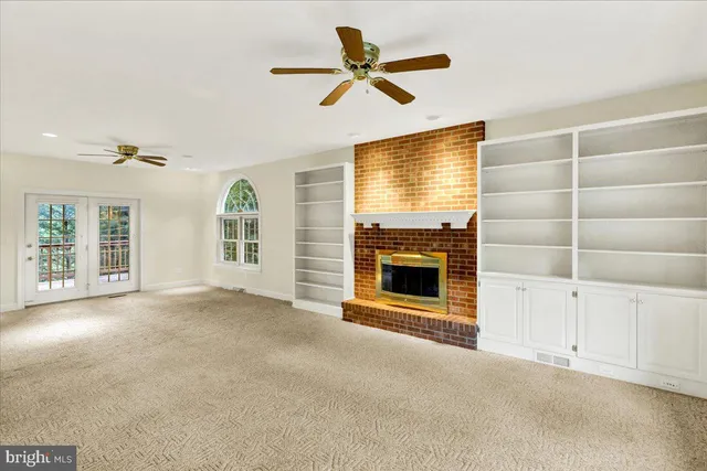 a view of a hallway with stairs