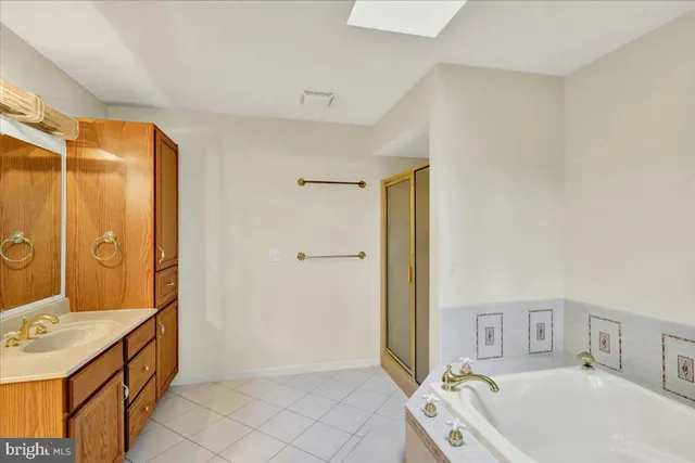 a view of a room with gym equipment and a window