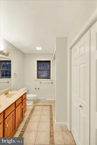 a bathroom with a sink a mirror and a shower