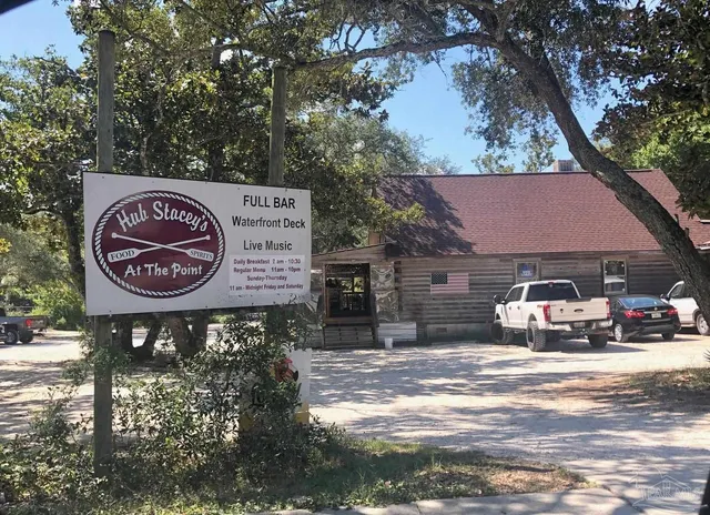 a view of a car park in front of a house