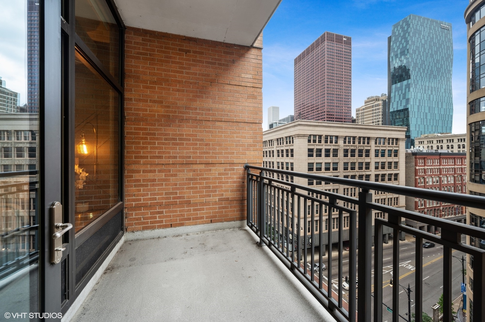 520 South State Street, Unit 908 Chicago, IL 60605 - Photo 15 of 16 a view of balcony with a brick wall