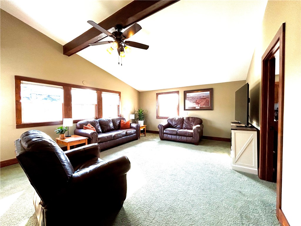 2086 Scheyhing Road Lewisburg, OH 45338 - Photo 10 of 29 This bright living area features vaulted ceilings, providing an open and airy atmosphere.
