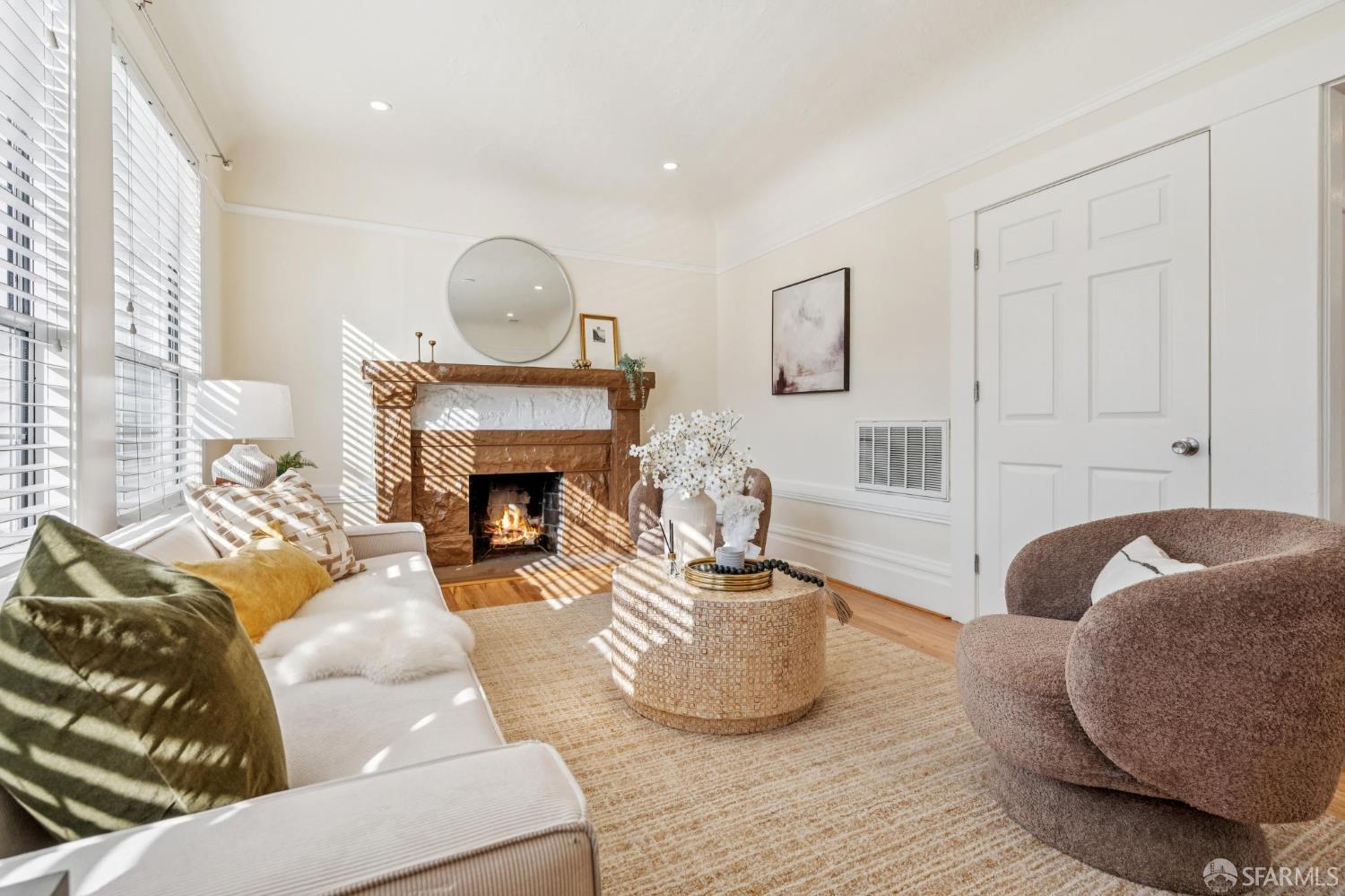 180 Ocean Avenue San Francisco, CA 94112 - Photo 11 of 62 a living room with furniture and a fireplace