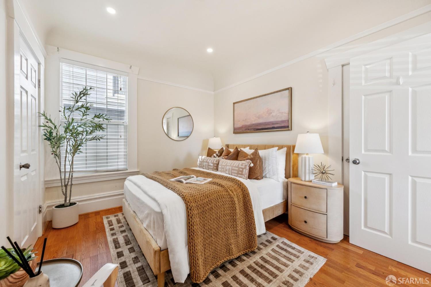 180 Ocean Avenue San Francisco, CA 94112 - Photo 30 of 62 a bedroom with a bed and a window
