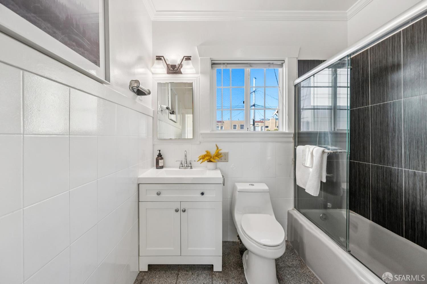 180 Ocean Avenue San Francisco, CA 94112 - Photo 35 of 62 a bathroom with a sink toilet and shower