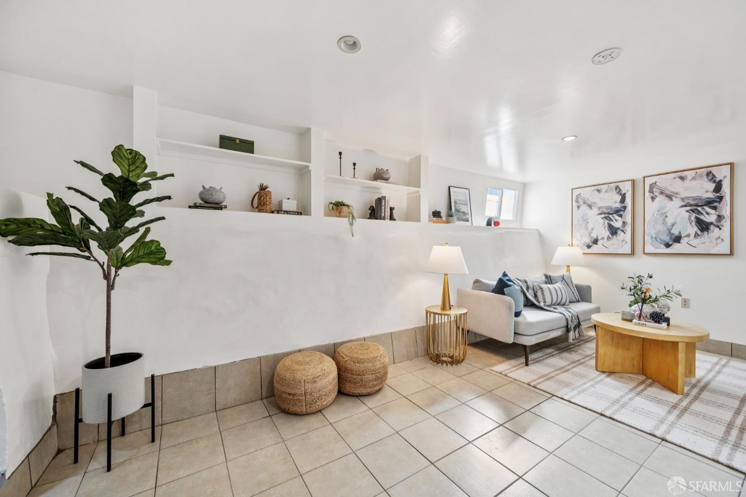 180 Ocean Avenue San Francisco, CA 94112 - Photo 42 of 62 a living room with furniture and a potted plant