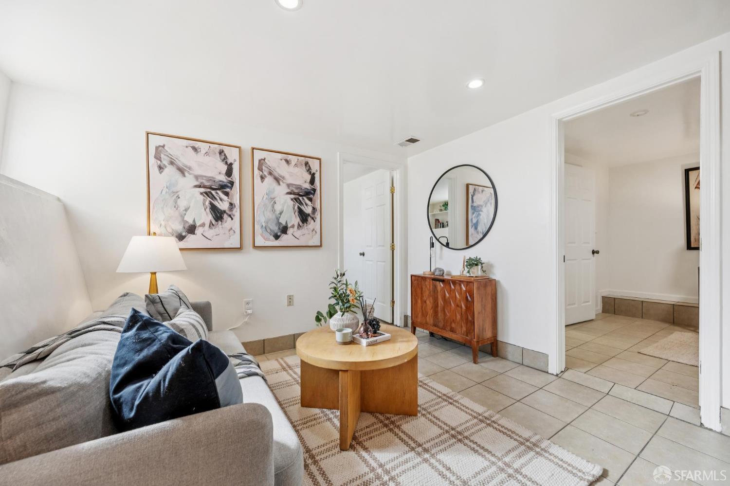 180 Ocean Avenue San Francisco, CA 94112 - Photo 44 of 62 a living room with furniture and a large window
