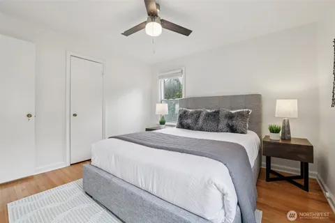 a bedroom with a bed and a dresser