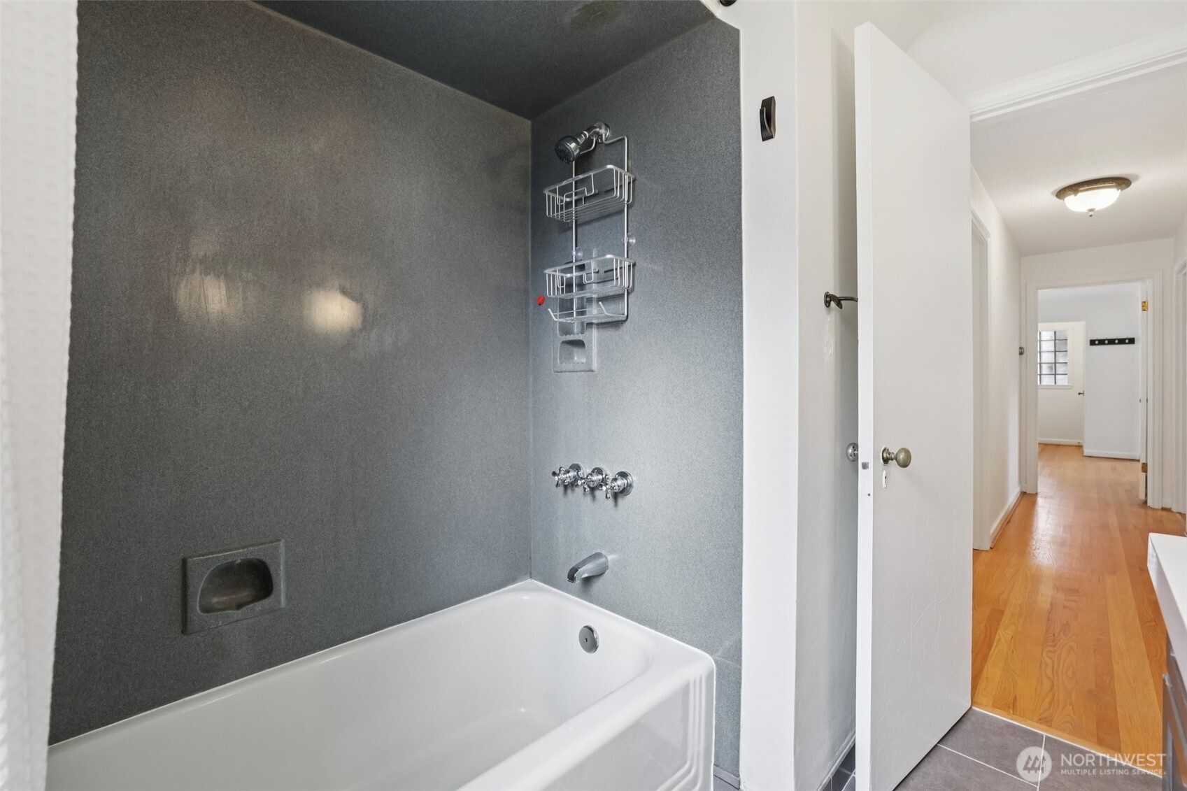 819 Northwest 80th Street Seattle, WA 98117 - Photo 18 of 37 a bathroom with a bathtub