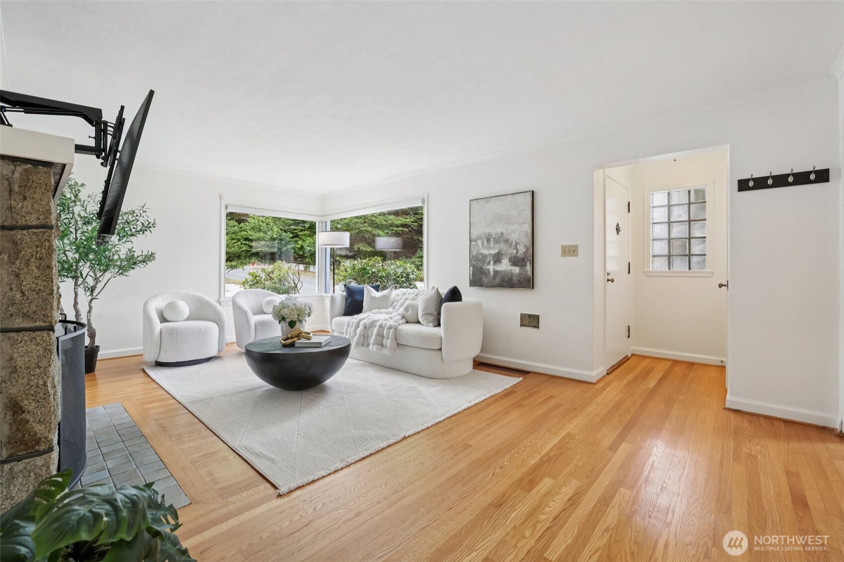 819 Northwest 80th Street Seattle, WA 98117 - Photo 4 of 37 a living room with furniture and a large window