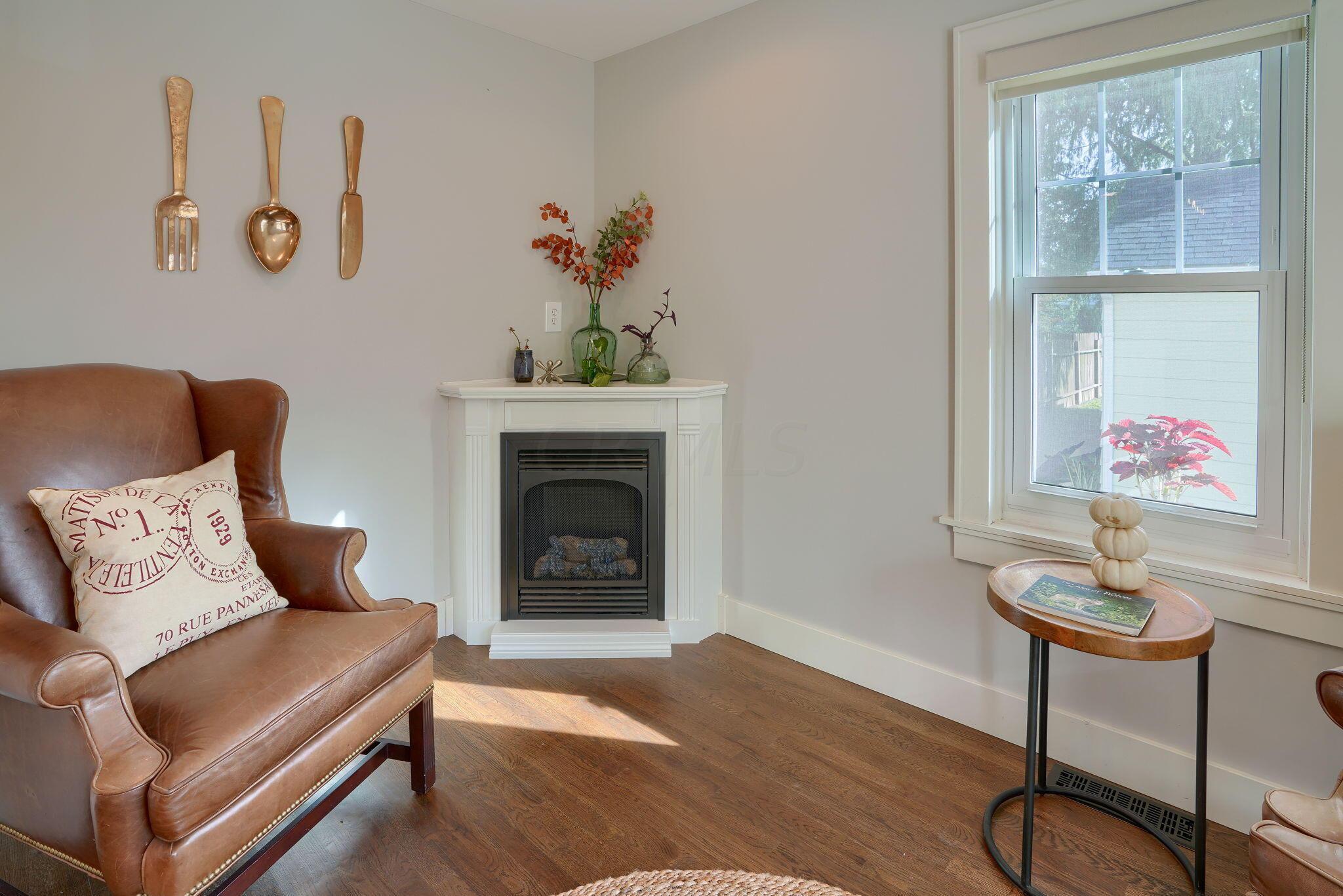 241 Garden Road Columbus, OH 43214 - Photo 44 of 85 Custom corner fireplace creates warm and cozy space for autumn nights