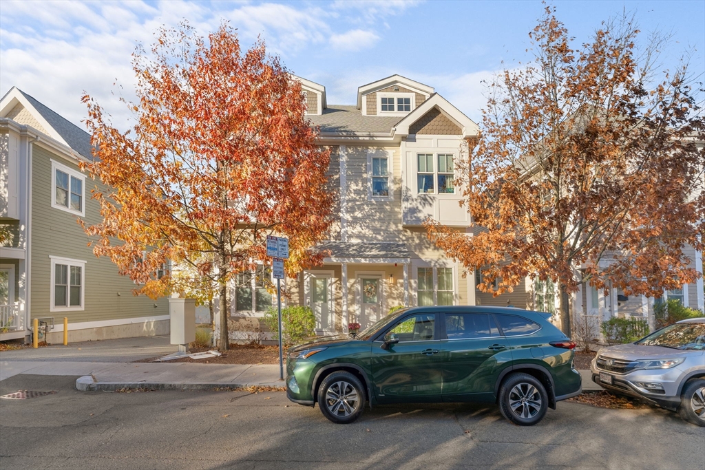 a car parked in front of a house