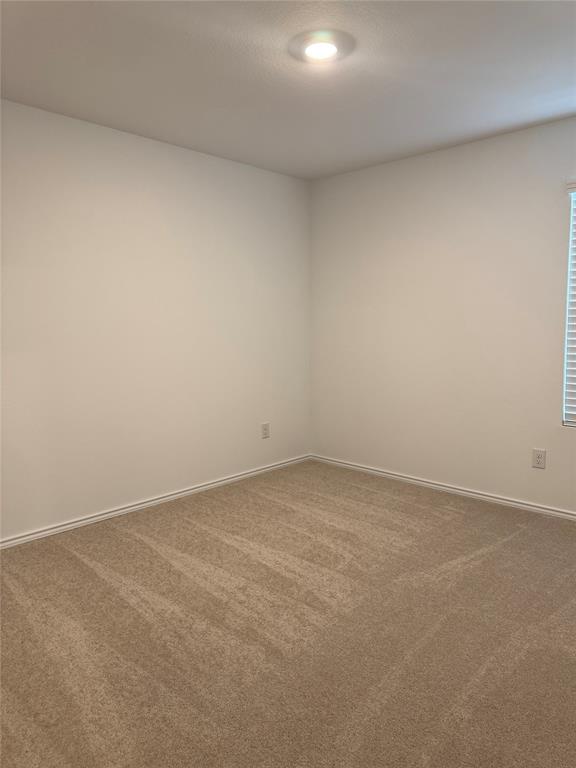 11719 Bone Spg Drive Rhome, TX 76078 - Photo 14 of 18 a view of an empty room